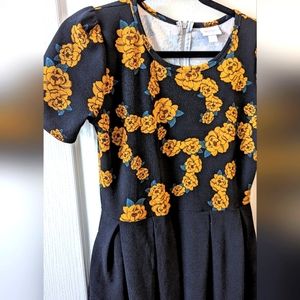 LuLaRoe Amelia gold floral with black skirt